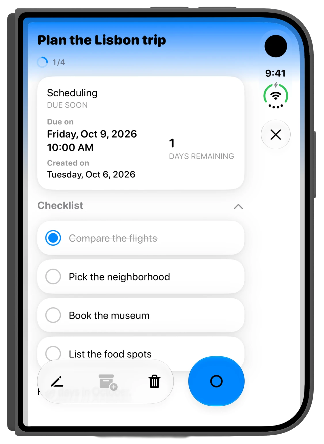 The Plan the Lisbon trip task opened on the folded iPhone Duo